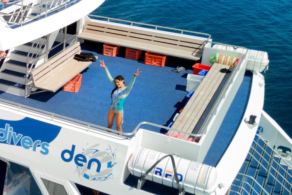 441802-woman-standing-on-the-sundeck-of-aquaquest-vessel